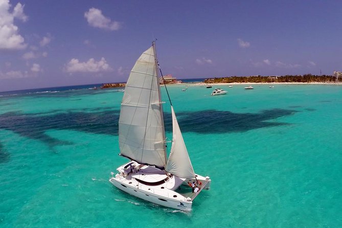Catamaran Tour to Isla Mujeres, Open Bar, Lunch, Snorkeling, Beach Club Included - Highlights of the Tour