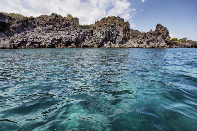 Catania: Full-Day Boat Trip to Acitrezza With Lunch - Trip Highlights