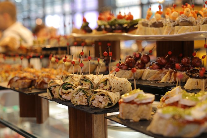 CERTAL Exclusive Tour: LA RIBERA Market + GASTROBARS Bilbao (3h) - Knowledgeable Guide Beatrice