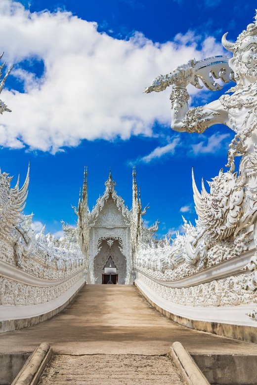 Chiang Rai: Temples, Waterfalls, Golden Triangle Guided Tour - Taking in the Vibrant Mae Sai Market