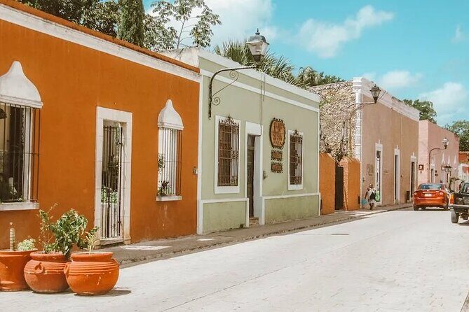 Chichen Itza, 2 cenotes Ik Kil and Hubiku, visit to Valladolid - Swimming in Cenote Ik Kil: A Magical Refreshment