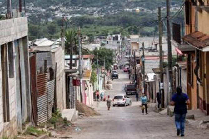 Chicken Buses & Niños De Guatemala Schools Tour – Ciudad Vieja - Charming and Knowledgeable Guide