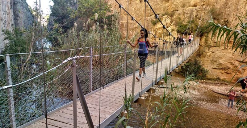 Chulilla: Hanging Bridges & Canyon Private Hiking Day Tour - Admiring Loriguilla Reservoirs Craftsmanship