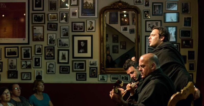 Coimbra: Live Fado Show With Glass of Port Wine - Experience Highlights