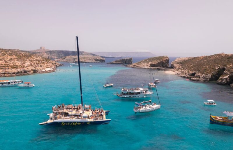 Comino: Blue Lagoon Catamaran Cruise With Lunch and Open Bar - Detailed Itinerary