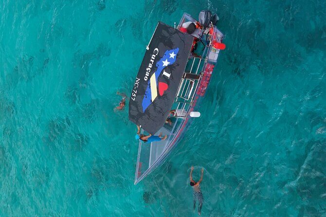 Curacao Flamingos Clear Boat Ride and Porto Marie Beach tour - Key Points