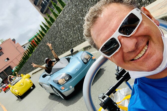 Cute & Fun E-Car Tour Following Guide Around Lake Kawaguchiko - Experiencing the Cherry Blossoms