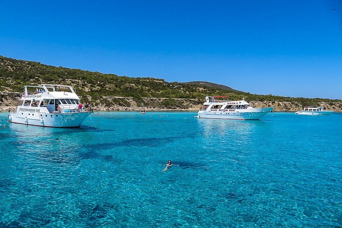 Day Trip to Blue Lagoon Latchi, Paphos, Coach, Boat+Water Slide. - Swimming at Blue Lagoon