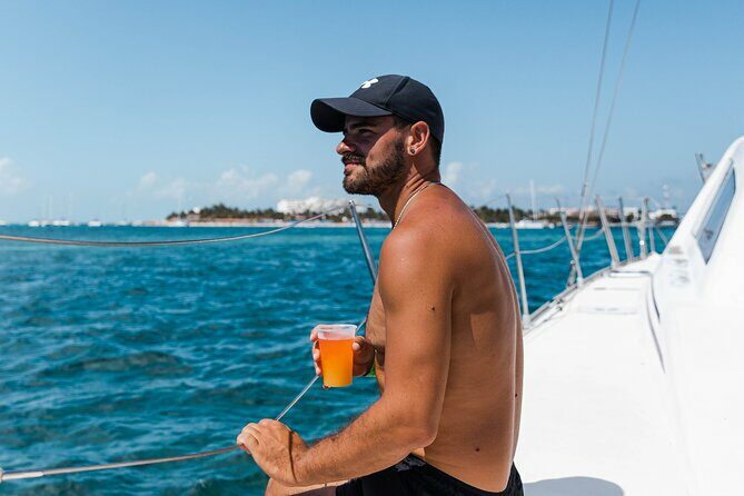 Deluxe Catamaran Tour to Isla Mujeres, Drinks, Snorkeling, Buffet - The Sum Up