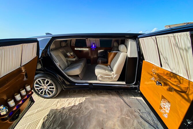 Deluxe GMC Limousine From CUN Airport to Playa Mujeres - Terminal 2 Meeting Point