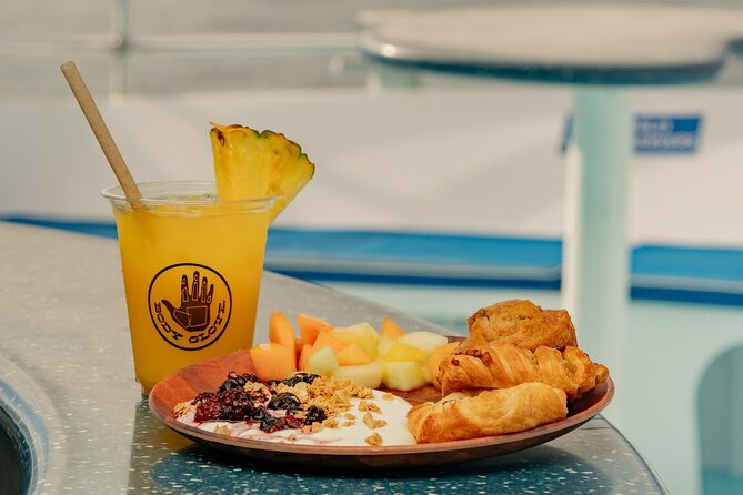 Deluxe Snorkel & Dolphin Watch Aboard a Luxury Catamaran From Kailua-Kona - Relax With Cocktails