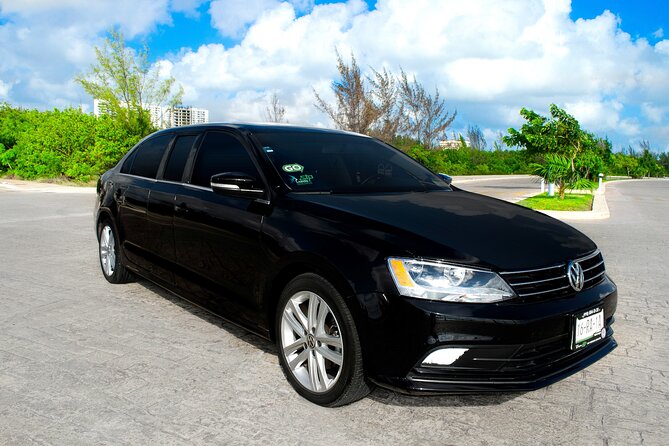 Departures in Luxury Sedan From Puerto Aventuras to CUN Airport - Key Points