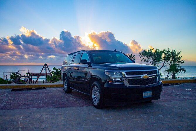 Departures in Luxury SUV From Puerto Aventuras to Cancun Airport - Key Points