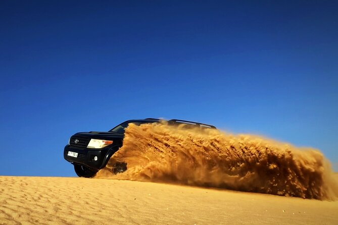 Desert Safari Dubai With BBQ - Dinner, Sandboarding - Included Experiences