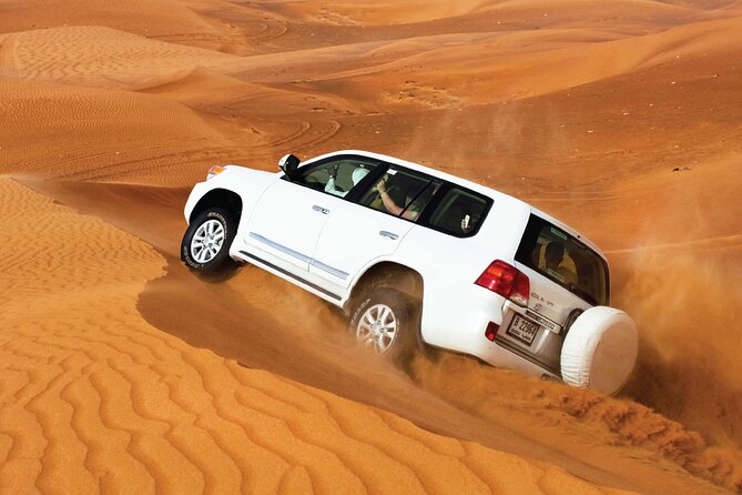 Desert Safari Redsand Dunes With BBQ Dinner in Dubai - Sandboarding on the Dunes