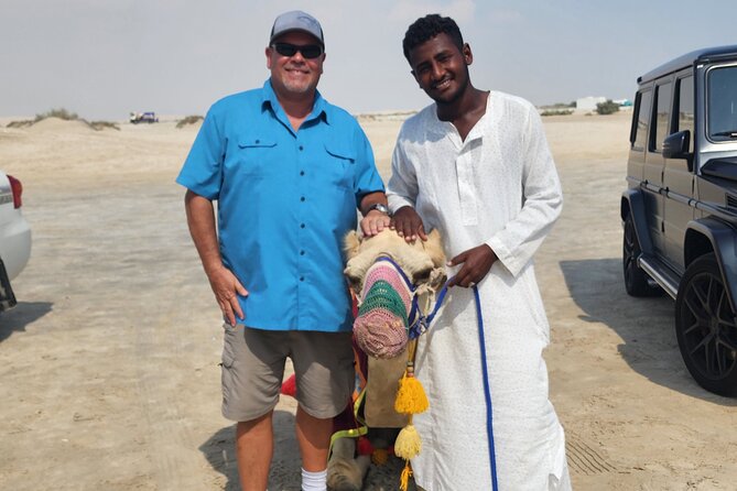 Desert Safari With Sandboarding and Inland Sea Private Tour - Sandboarding Experience