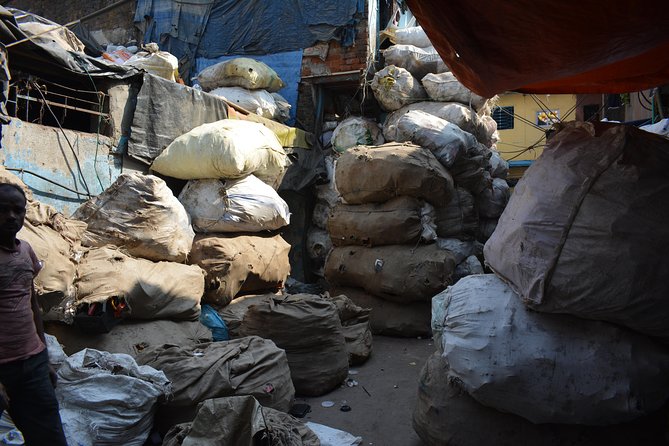 Dharavi Slum Tour by the 1st Female Tour Guide of Mumbais Slum - Visiting Kumbharwada Pottery Workshops