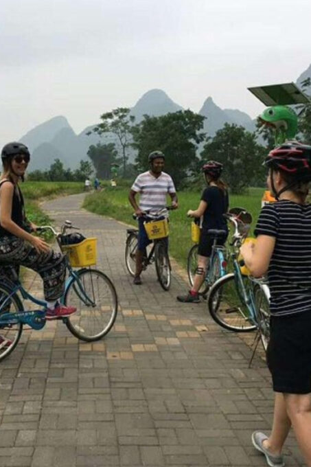 Dingding Yangshuo Country Road Biking Tour &Bamboom Rafting - Free Cancellation