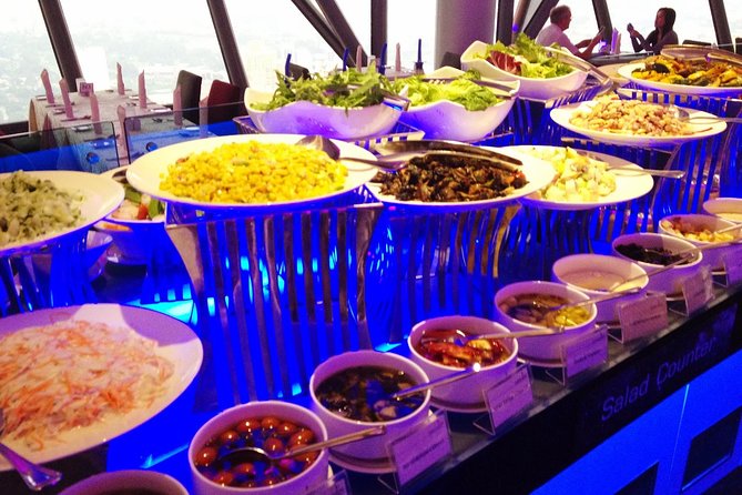 Dining at ARAS Revolving Restaurant KL Tower With Return Transfer - Cancellation and Pricing Information