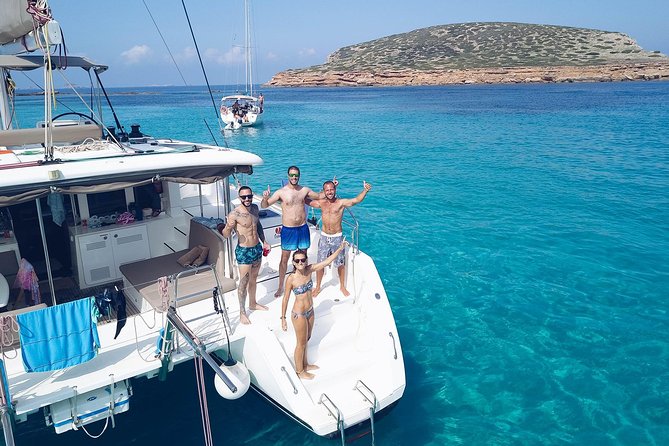 Discover Cala Bassa and Cala Comte on Board a Catamaran - Catamaran Adventures