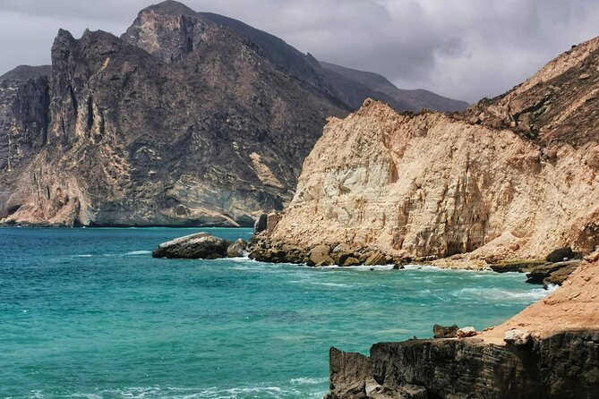 Discover Dhofar (East and West) White Beach, Waterfall, Camels & Mountains - Inclusions and Exclusions