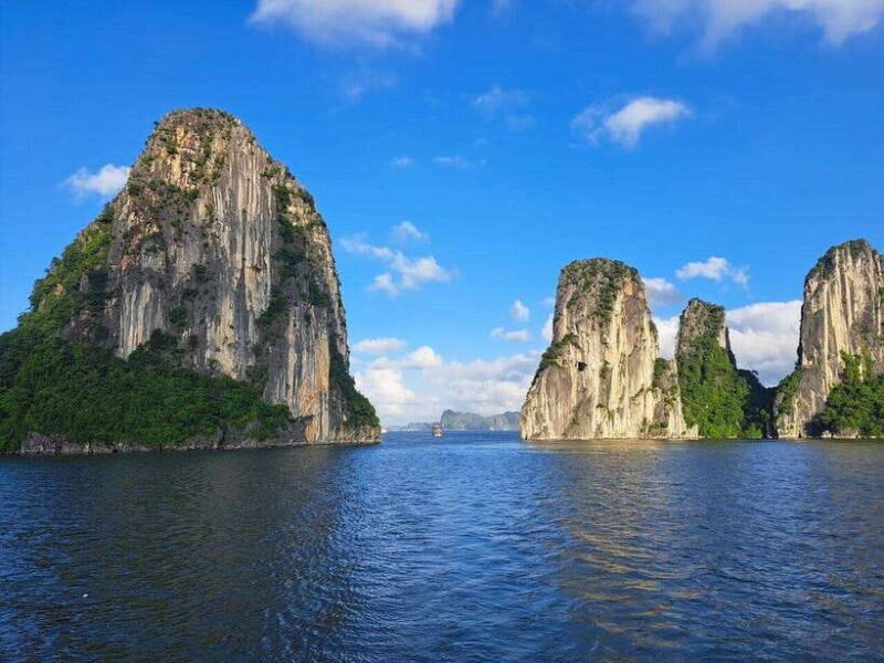 Discover Halong Bay 4-hour Scenic Cruise, Kayak, Lunch, Cave - Cruising Through Iconic Islets