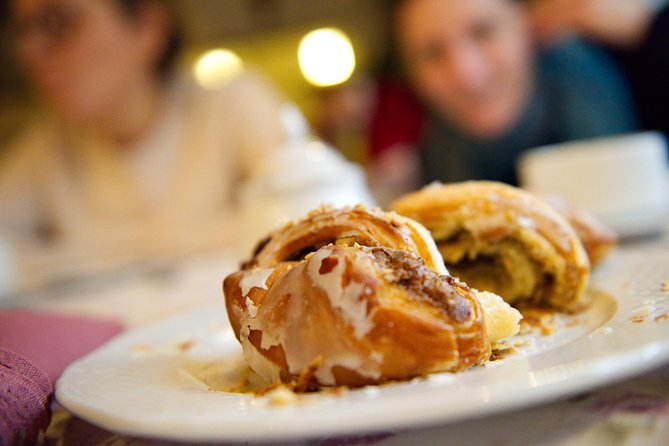 Discover Poznan: Walk, Take a Tram and Have a Traditional Snack - Meeting Point and End Location