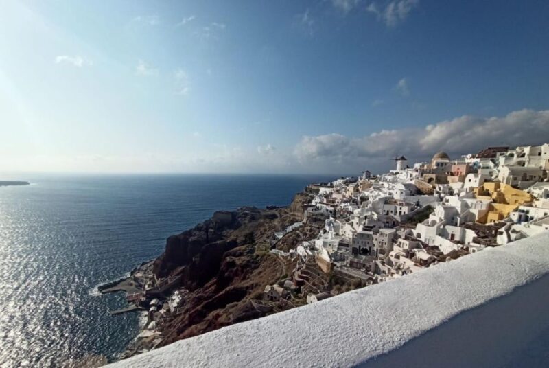 Discover Santorinis Charms: Private Day Trip From Crete - Exploring Oias Breathtaking Vistas