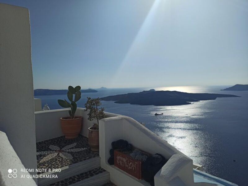 Discover Santorinis Charms: Private Day Trip From Crete - Taking in Pyrgos Medieval Charm