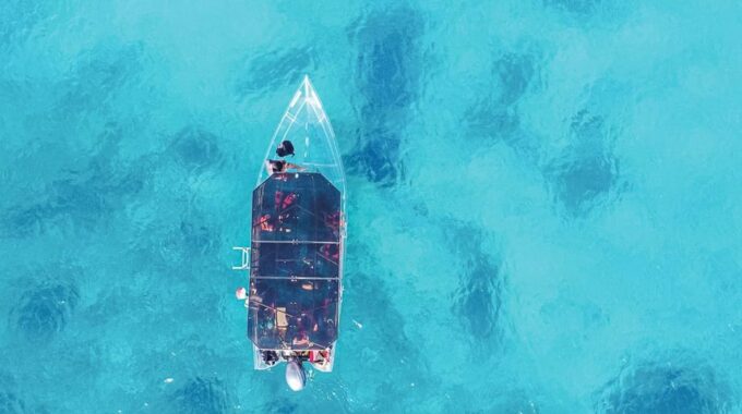 Discover the Beautiful Isla Mujeres Transparent Boat Tour - Transparent Boat Exploration
