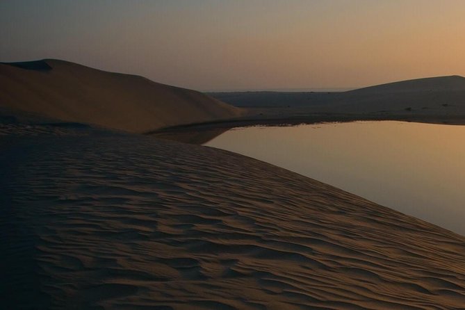 Doha: Desert Safari With Quad Bike ,Camel Ride and Sand Boarding - Sandboarding Activity