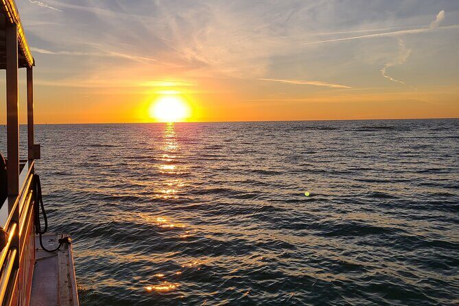 Dolphin Sunset Cruise with Drinks Included - The Itinerary: From Vibrant Docks to Pristine Beaches