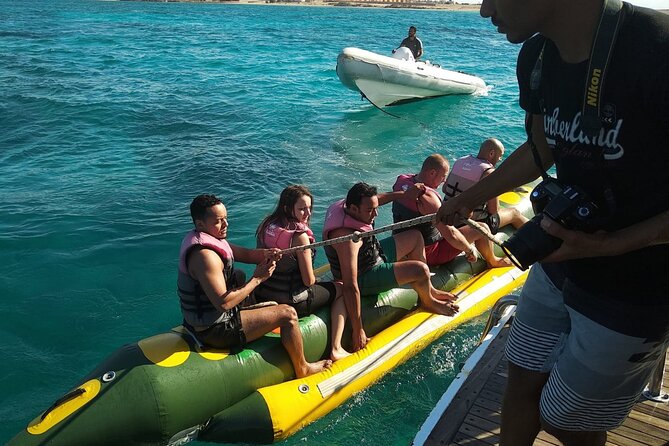 Dolphin Tour & Banana Boat Fun With Snorkeling From Hurghada - Accessibility and Group Size