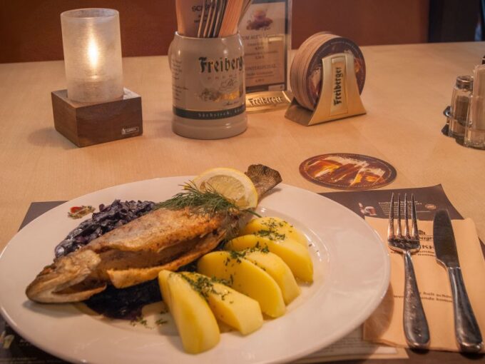 Dresden: Walking Tour With a Night Watchman and Meal - Imbibing Regional Beverages