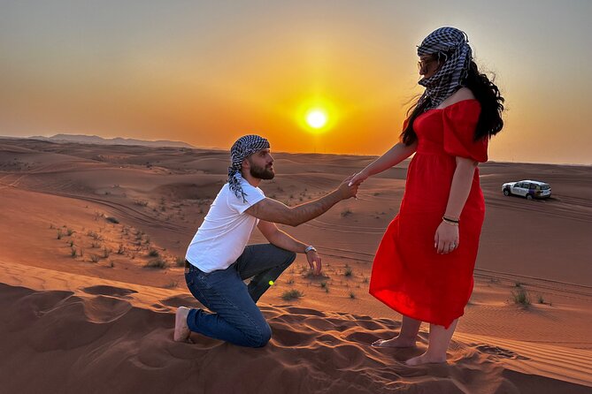 Dubai Desert Safari With Camel Ride Sand Board & BBQ Dinner - Dune Bashing Experience