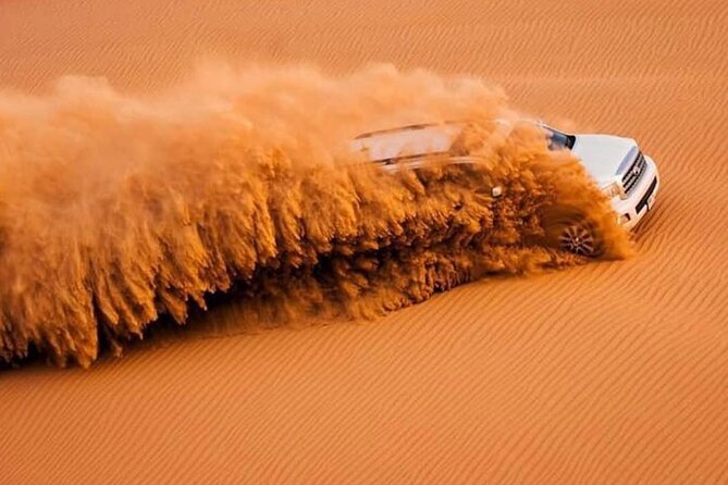 Dubai Desert Safari With Free Quad Bike and BBQ Dinner - Meeting and Pickup