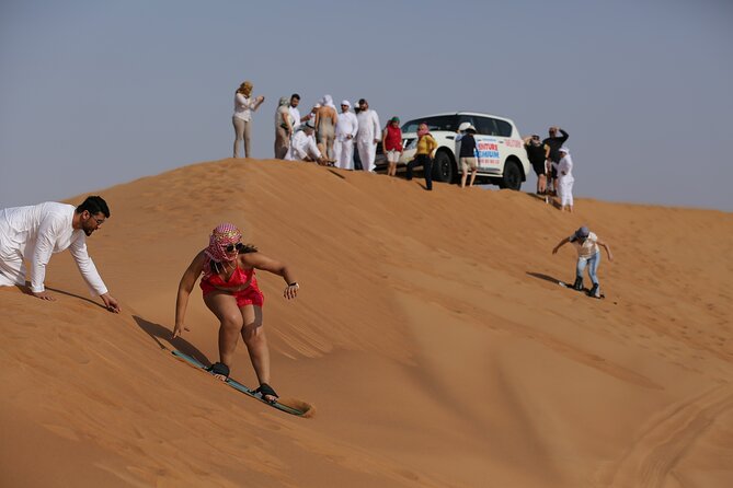 Dubai Desert Safari With Quad Bike, Dune Bashing, Camel Ride, Sand Boarding &Bbq - Guide Performance and Service Quality