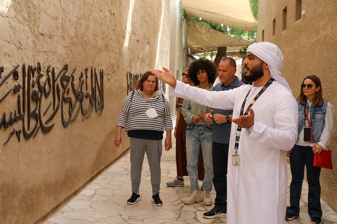 Dubai: Photography Tour in Al Fahidi District W/Abra Ride - Booking and Cancellation