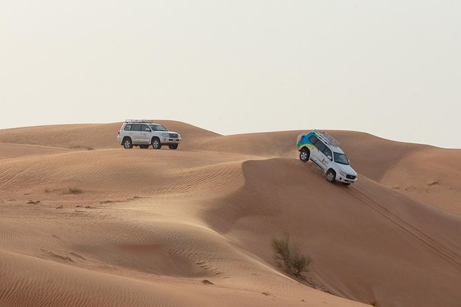 Dubai Premium Desert Safari With BBQ Dinner in Red Dunes - Pickup and Duration