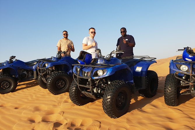 Dubai: Red Dune ATV, Sandsurf, Camels, Stargazing & Camp Dinner - Sunset Photo Stop
