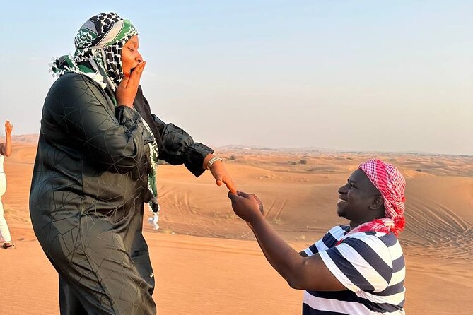 Dubai Red Dune Desert Safari Camel Ride Sandboard & BBQ Dinner - Transportation and Pickup
