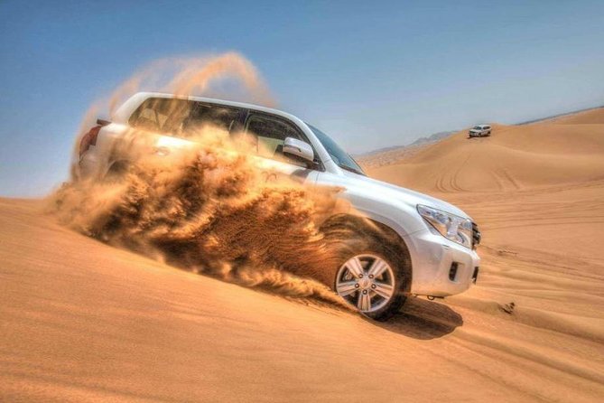 Dubai Red Dune Desert Safari With BBQ Dinner - Transportation and Pickup