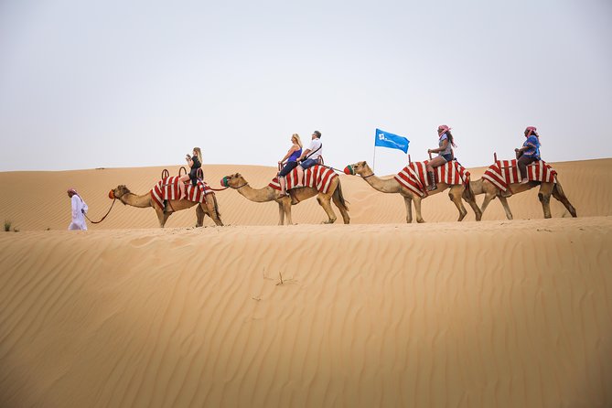 Dubai Red Dunes Desert Safari, Sandsurf, Camel & Quad Bike Option - Just The Basics