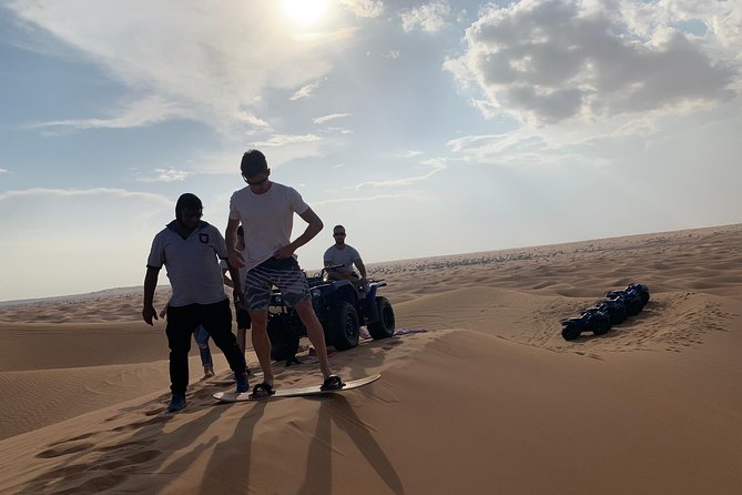 Dubai: Unique SUNSET Quad Bike Red Dunes Safari - Sandboarding Adventure