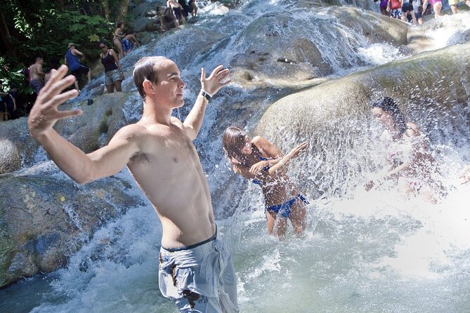 Dunns River Falls & Luminous Lagoon Guided Tour From Montego Bay - Exploring Dunns River Falls