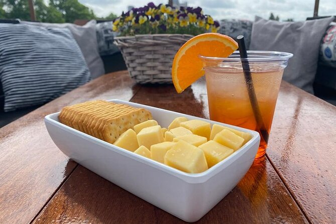 Dutch Cheese and Drinks Guided Amsterdam Boat Tour - Navigating the Canals
