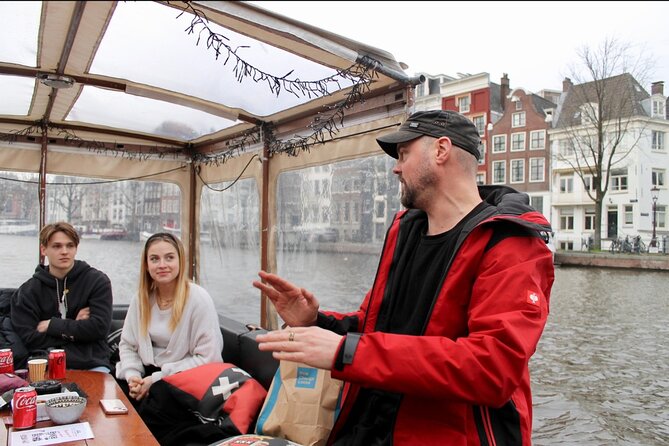 Dutch Cheese and Drinks Guided Amsterdam Canal Cruise With Locals - Sipping on Local Beverages