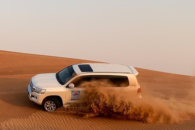 DXB Private Morning Desert Safari With Camel Ride N Sand Boarding - Sandboarding on the Dunes