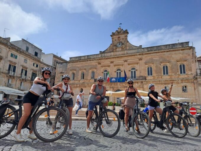 E-Bike Tour in Ostuni. Huge Olive Trees and a Rock Village - Strolling Through Ostunis Walls
