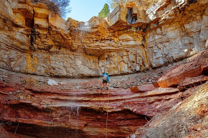 East Zion: Stone Hollow Full-day Canyoneering Adventure - Scaling Cliffs and Navigating Rugged Terrain